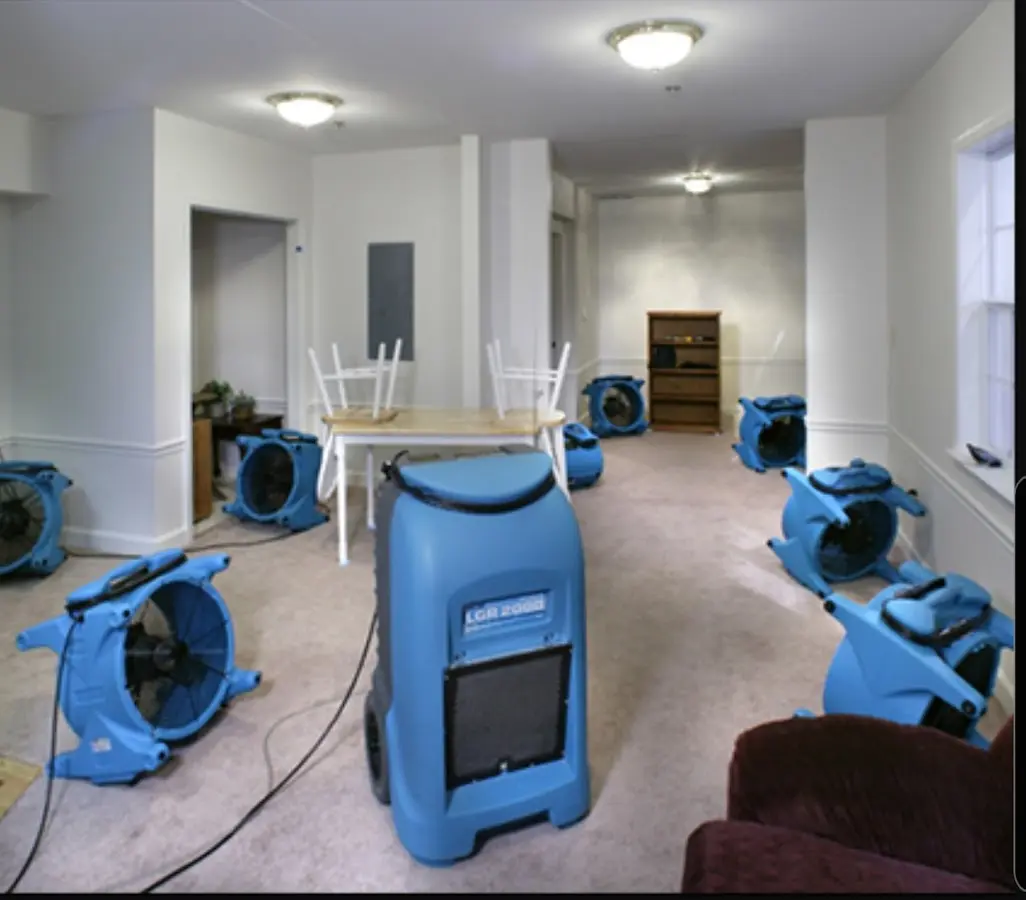 Air movers and dehumidifier setup for Water Damage Restoration in Channahon